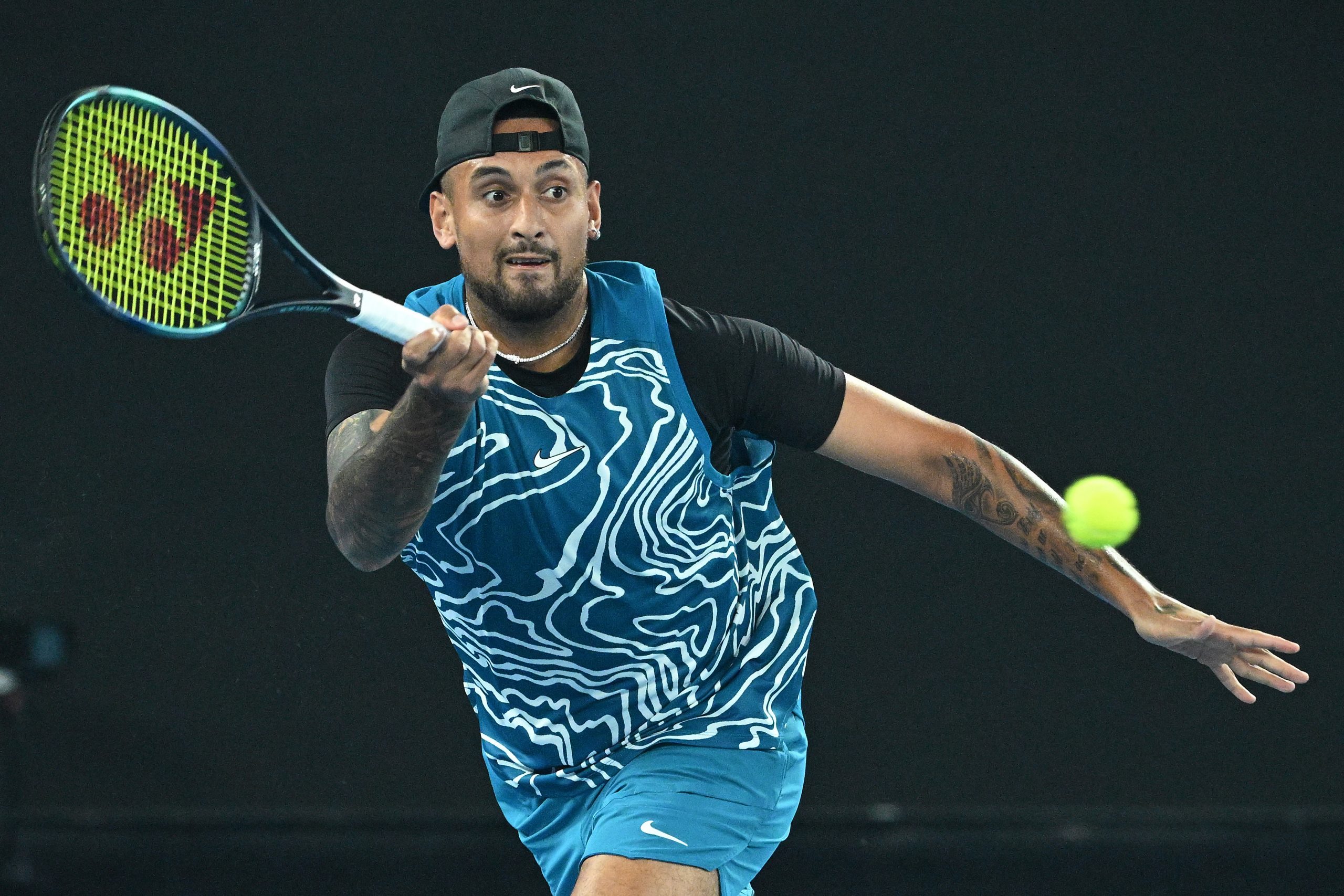 epa10402627 Nick Kyrgios of Australia in action against Novak Djokovic of Serbia during a practice match ahead of the 2023 Australian Open tennis tournament at Melbourne Park in Melbourne, Australia, 13 January 2023.  EPA/JAMES ROSS  AUSTRALIA AND NEW ZEALAND OUT