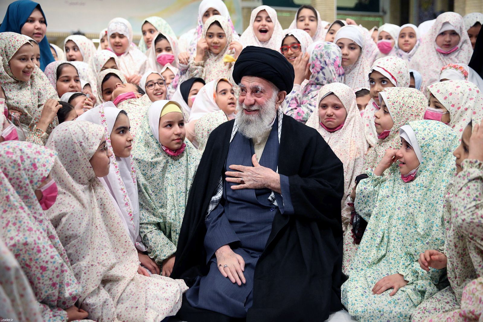 epa10446437 A handout photo made available by the Iranian supreme leader office shows Iranian supreme leader Ayatollah Ali Khamenei praying with little Iranian girls during a ceremony called 'Angels celebration' in Tehran, Iran, 03 February 2023 (issued on 04 February 2023).  EPA/KHAMENEI OFFICE HANDOUT  HANDOUT EDITORIAL USE ONLY/NO SALES