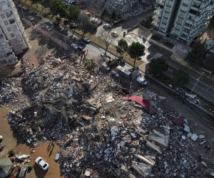 epa10452861 An aerial photo taken with a drone shows collapsed buildings in the aftermath of a powerful earthquake in the center of Kahramanmaras, southeastern Turkey, 07 February 2023. More than 4,000 people were killed and thousands more injured after a major 7.8 magnitude earthquake struck southern Turkey and northern Syria on 06 February. Authorities fear the death toll will keep climbing as rescuers look for survivors across the region.  EPA/NECATI SAVAS