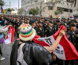 epa10458002 Members of the police are deployed during a national strike called by the General Confederation of Workers of Peru, in Lima, Peru, 09 February 2023. The protest strike demands the resignation of Boluarte, a transitional government with the election of new leadership in Congress, and the call for a referendum for a new constitution to replace the current one, which was drawn up in 1993 under the government of former President Alberto Fujimori (1990-2000).  EPA/Stringer