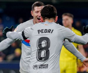epa10463886 Barcelona's Pedri celebrates scoring the 0-1 goal with teammate Robert Lewandowski (back) during the LaLiga soccer match between Villarreal and Barcelona, in La Ceramica stadium, Villarreal, Spain, 12 February 2023.  EPA/Manuel Bruque