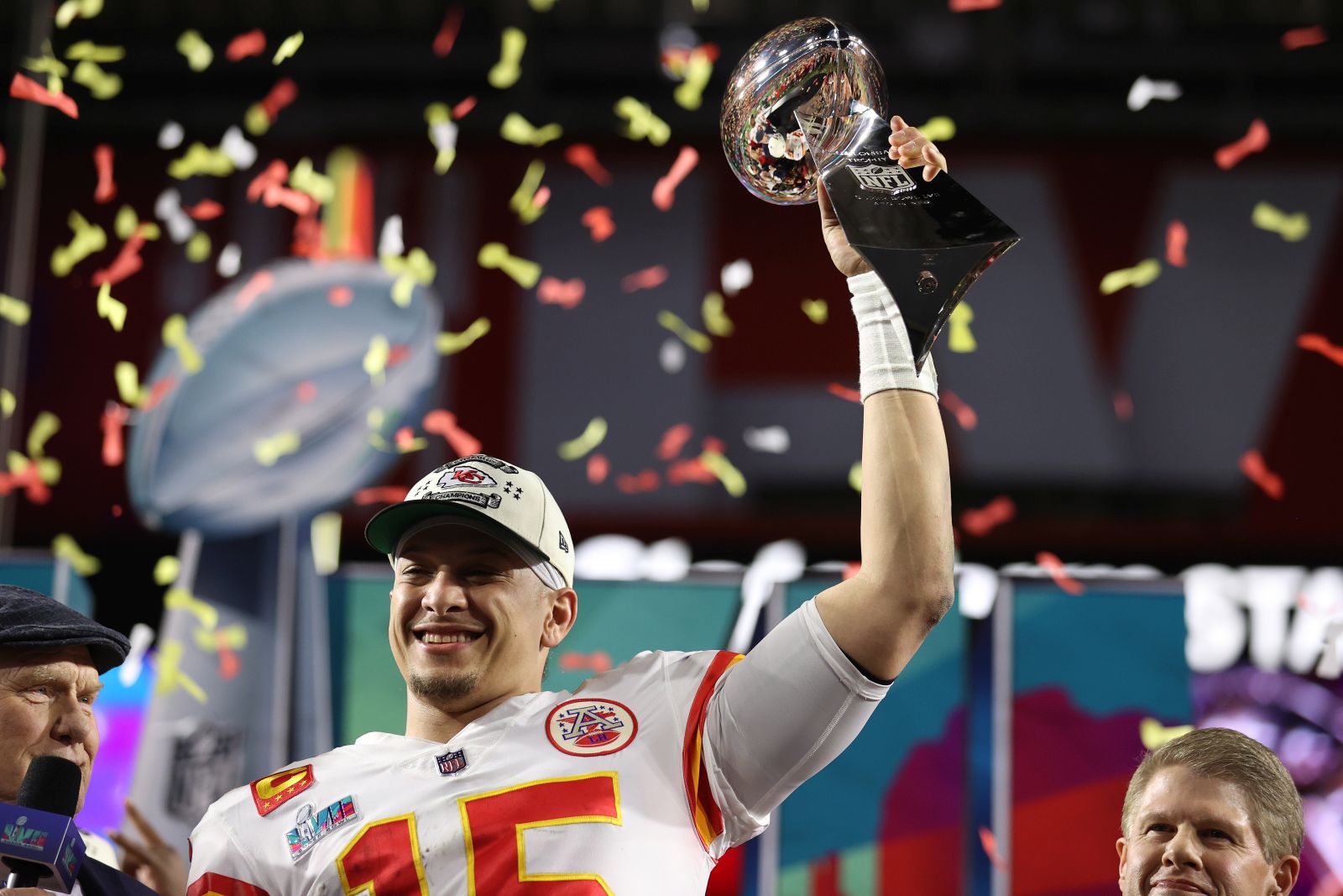 epa10464373 Kansas City Chiefs quarterback Patrick Mahomes hoists the Vince Lombardi Trophy after defeating the Philadelphia Eagles in Super Bowl LVII between the AFC champion Kansas City Chiefs and the NFC champion Philadelphia Eagles at State Farm Stadium in Glendale, Arizona, 12 February 2023. The annual Super Bowl is the Championship game of the NFL between the AFC Champion and the NFC Champion and has been held every year since January of 1967.  EPA/CAROLINE BREHMAN