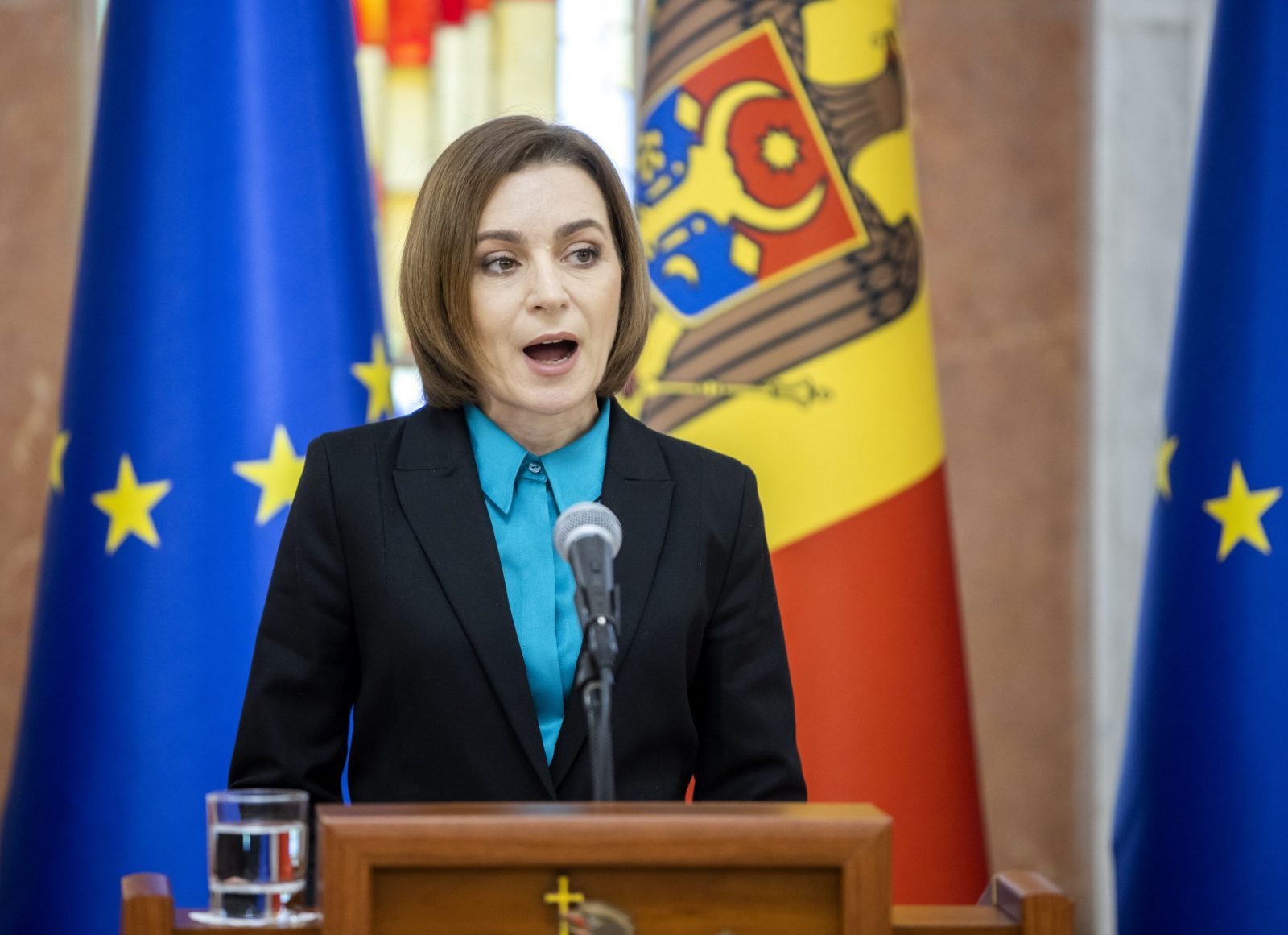 epa10464899 President of Moldova Maia Sandu speaks during a press briefing at the presidential palace in Chisinau, Moldova, 13 February 2023. Sandu spoke about the possibility of threats to national security allegedly posed by Russia to remove the current pro-European power from Chisinau through the involvement of people from outside the country.  EPA/DUMITRU DORU