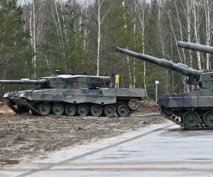 epa10465034 Leopard tanks are parked at a training site in Swietoszow, west Poland, 13 February 2023. The 10th Armored Cavalry Brigade, part of the 11th Armored Cavalry Division, is training personnel of the Armed Forces of Ukraine within the framework of the European Union Military Assistance Mission Ukraine (EUMAM Ukraine). The training includes, among other things, the training of crews of Leopard tanks, transferred to Ukraine.  EPA/Maciej Kulczynski POLAND OUT
