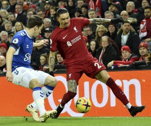 epa10465621 Darwin Nunez (R) of Liverpool in action against Seamus Coleman (L) of Everton during the English Premier League soccer match between Liverpool FC and Everton FC in Liverpool, Britain, 13 February 2023.  EPA/PETER POWELL EDITORIAL USE ONLY. No use with unauthorized audio, video, data, fixture lists, club/league logos or 'live' services. Online in-match use limited to 120 images, no video emulation. No use in betting, games or single club/league/player publications