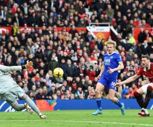 epa10478694 Manchester United's Wout Weghorst (L) has his shot saved during the English Premier League soccer match between Manchester United and Leicester City in Manchester, Britain, 19 February 2023.  EPA/Peter Powell EDITORIAL USE ONLY. No use with unauthorized audio, video, data, fixture lists, club/league logos or 'live' services. Online in-match use limited to 120 images, no video emulation. No use in betting, games or single club/league/player publications