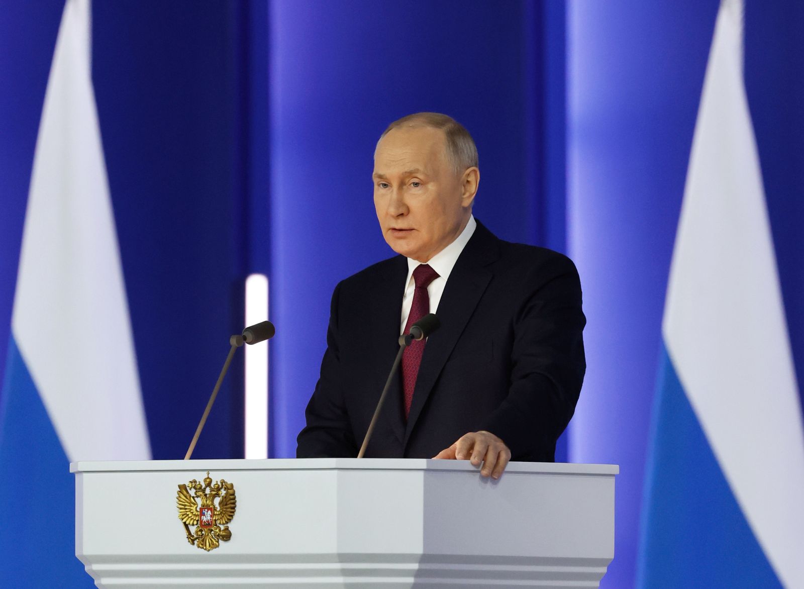 epa10481355 Russia's President Vladimir Putin delivers his annual address before the Federal Assembly at the Gostiny Dvor conference center in Moscow, Russia, 21 February 2023. 'The goal of the West is to inflict a strategic defeat on Russia, to end us once and for all. We will react accordingly, because we are talking about the existence of our country', Putin said during his state of the nation address. About 1,200 people, including lawmakers of Russia’s two-chamber parliament, Government members, heads of the Constitutional and Supreme court, and regional governors, were invited to attend the event.  EPA/DMITRY ASTAKHOV / SPUTNIK / GOVERNMENT PRESS SERVICE POOL MANDATORY CREDIT