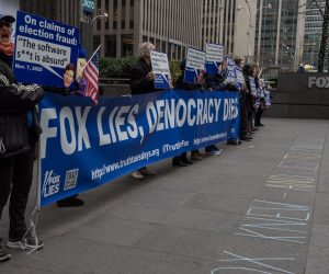 epa10482269 People protest outside of the Fox News headquarters in response to the Dominion lawsuit against Fox Corporation in New York, New York, USA, 21 February 2023. Dominion’s defamation suit is in response to the 2020 election, alleging far-right conspiracy theories tying the company’s machines to election fraud have negatively impacted their business.  EPA/SARAH YENESEL