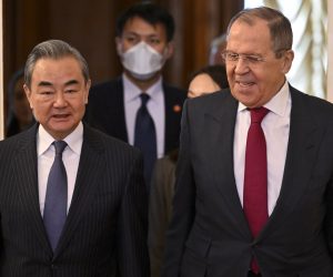epa10483107 Russian Foreign Minister Sergei Lavrov (R) and China's Director of the Office of the Central Foreign Affairs Commission Wang Yi (L) enter a hall during a meeting in Moscow, Russia, 22 February 2023. Wang Yi arrived in Moscow on 21 February, and engaged in negotiations with the Secretary of the Security Council of the Russian Federation Nikolai Patrushev. At this meeting, Wang Yi stressed that Chinese-Russian relations are 'strong as a rock' and 'will stand the test in the changing international situation.' According to Wang Yi, Beijing is ready, together with Moscow, to resolutely defend national interests and promote mutually beneficial cooperation in all areas.  EPA/ALEXANDER NEMENOV / POOL