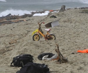 epa10491828 Debris, among them a bicycle for children, washed ashore at a beach near Cutro, Crotone province, southern Italy, 26 February 2023. Italian authorities said on 26 February that at least 30 bodies were found on the beach and in the sea near Crotone, in the southern Italian region of Calabria, after a boat carrying migrants sank in rough seas near the coast. About forty people survived the accident, Italian firefighters added. Authorities fear the death toll will climb as rescuers look for survivors.  EPA/GIUSEPPE PIPITA