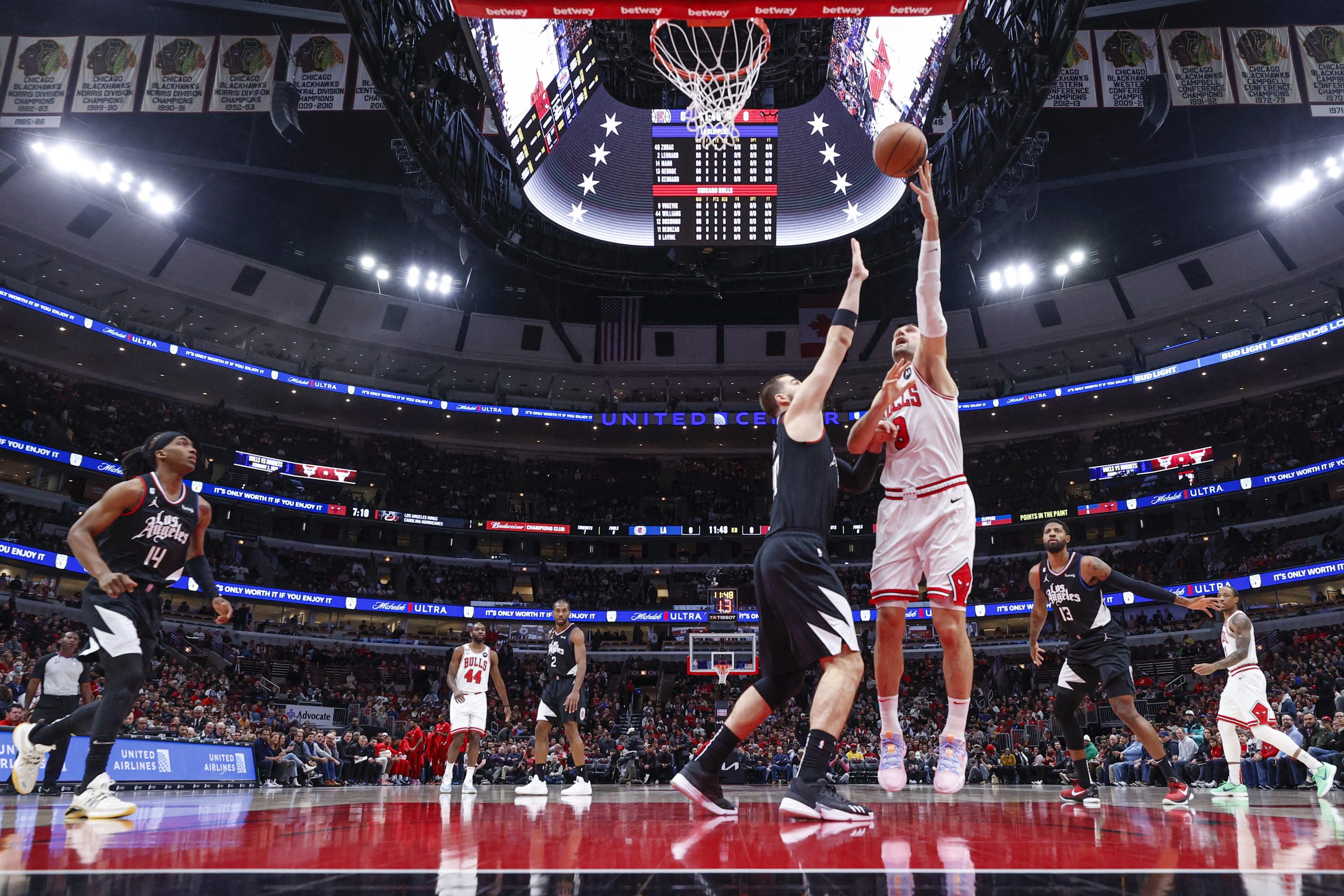 Jan 31, 2023; Chicago, Illinois, USA; Chicago Bulls center Nikola Vucevic (9) shoots against LA Clippers center Ivica Zubac (40) during the first half at United Center. Mandatory Credit: Kamil Krzaczynski-USA TODAY Sports Photo: KAMIL KRZACZYNSKI/REUTERS