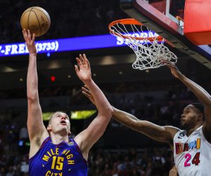 Feb 13, 2023; Miami, Florida, USA; Denver Nuggets center Nikola Jokic (15) shoots the basketball over Miami Heat forward Haywood Highsmith (24) during the third quarter at Miami-Dade Arena. Mandatory Credit: Sam Navarro-USA TODAY Sports Photo: Sam Navarro/REUTERS