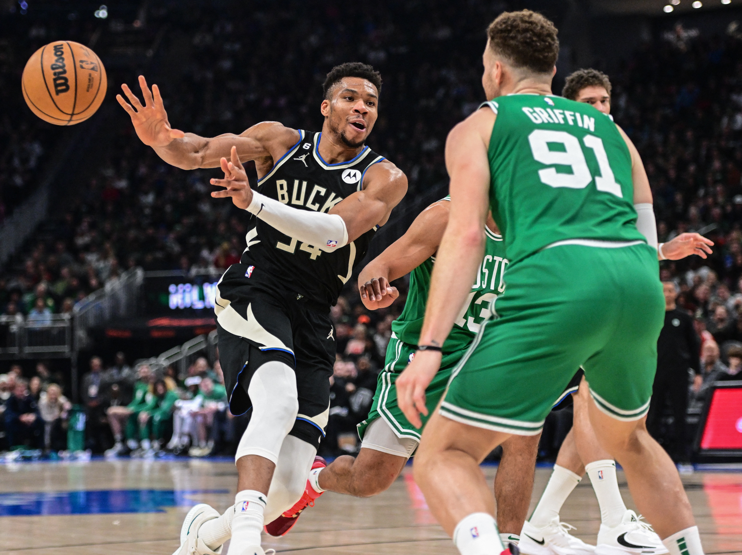 Feb 14, 2023; Milwaukee, Wisconsin, USA;  Milwaukee Bucks forward Giannis Antetokounmpo (34) passes against Boston Celtics forward Blake Griffin (91) in the second quarter at Fiserv Forum. Mandatory Credit: Benny Sieu-USA TODAY Sports Photo: Benny Sieu/REUTERS