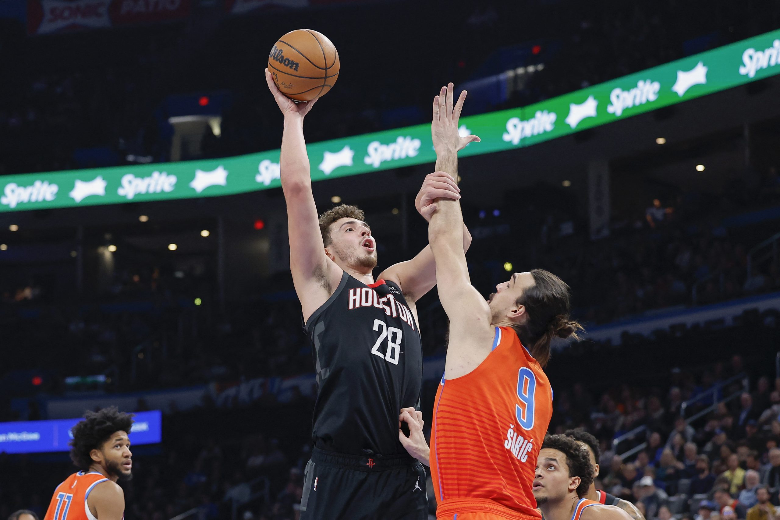 Feb 15, 2023; Oklahoma City, Oklahoma, USA; Houston Rockets center Alperen Sengun (28) shoots against Oklahoma City Thunder forward Dario Saric (9) during the first quarter at Paycom Center. Mandatory Credit: Alonzo Adams-USA TODAY Sports Photo: Alonzo Adams/REUTERS