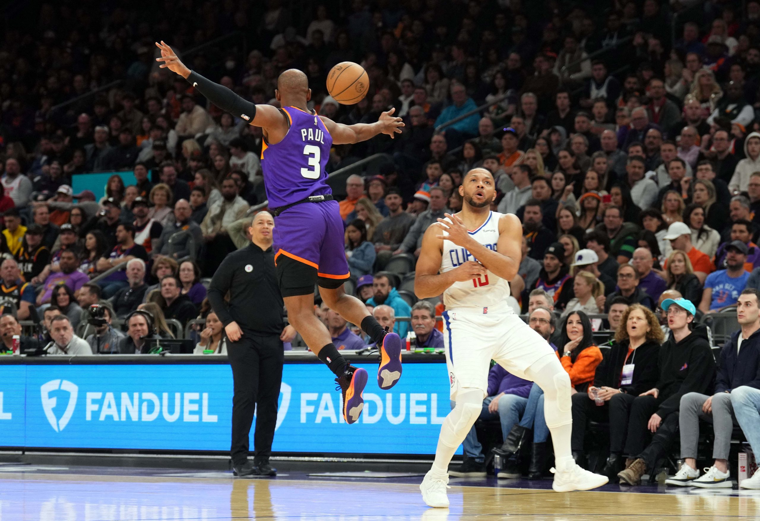 Feb 16, 2023; Phoenix, Arizona, USA; Phoenix Suns guard Chris Paul (3) breaks up a pass intended for LA Clippers guard Eric Gordon (10) during the second half at Footprint Center. Mandatory Credit: Joe Camporeale-USA TODAY Sports Photo: Joe Camporeale/REUTERS