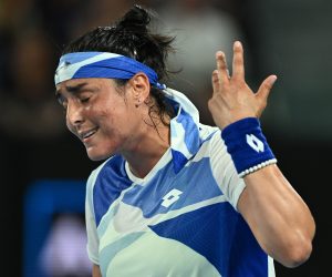 epa10410634 Ons Jabeur of Tunisia in action against Tamara Zidansek of Slovenia during their first round match at the 2023 Australian Open tennis tournament at Melbourne Park in Melbourne, Australia, 17 January 2023.  EPA/JOEL CARRETT AUSTRALIA AND NEW ZEALAND OUT
