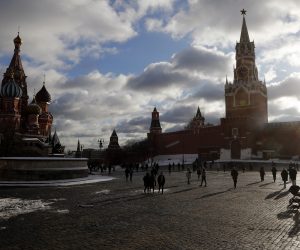 epa10466790 People walk at the Red Square after a snowfall in Moscow, Russia, 14 February 2023. Temperature in Moscow reached zero degrees Celsius.  EPA/MAXIM SHIPENKOV