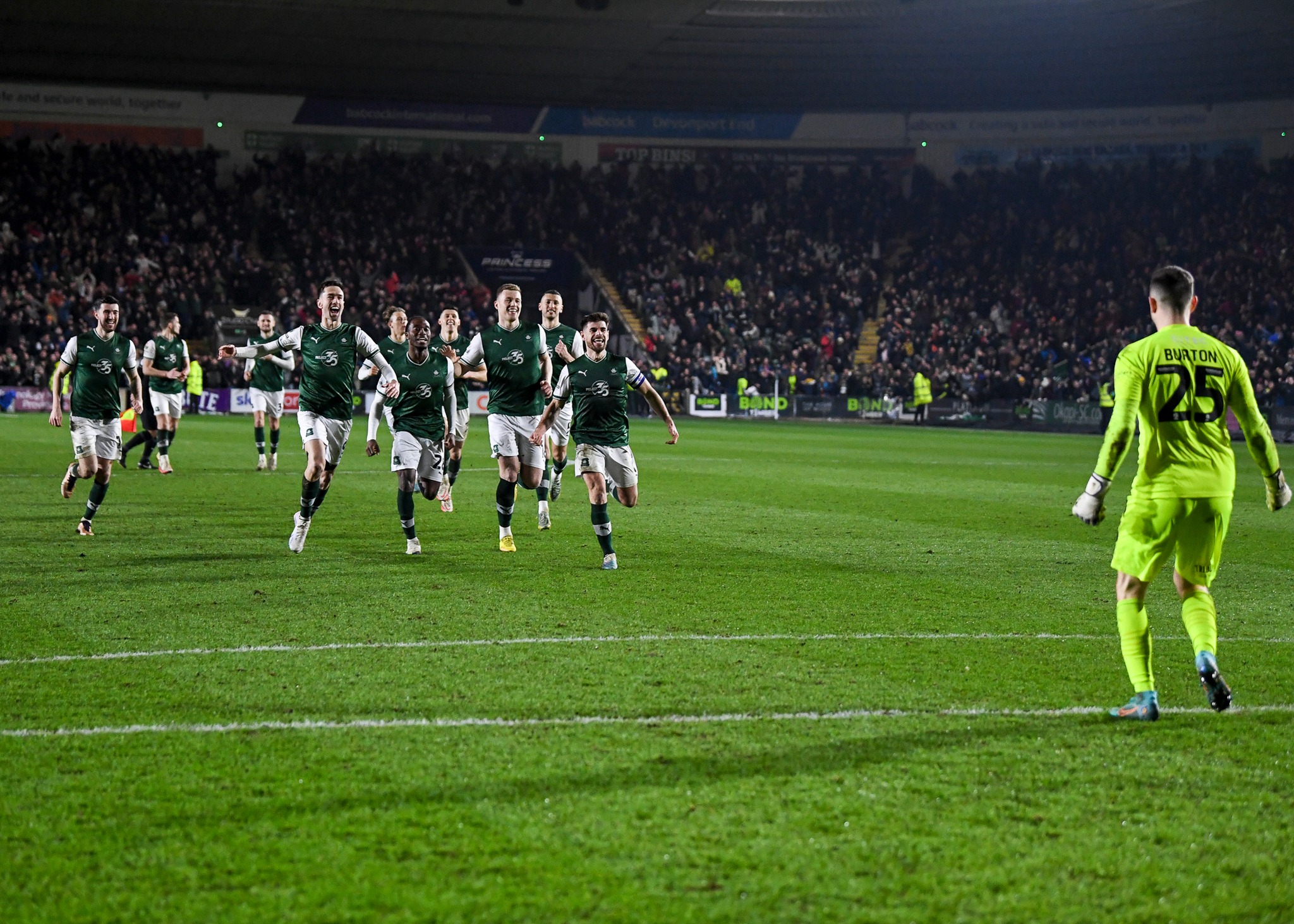 Plymouth Argyle players celebrates a win at full time which sent them to Wembley  during the Papa John's Trophy match Plymouth Argyle vs Cheltenham Town at Home Park, Plymouth, United Kingdom, 21st February 2023

(Photo by Stanley Kasala/News Images)