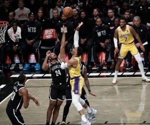 epa10440638 Los Angeles Lakers guard Russell Westbrook (C) shoots over Brooklyn Nets forward Cam Thomas (L) during the first half of the NBA basketball game between the Los Angeles Lakers and the Brooklyn Nets at Barclays Center in Brooklyn, New York, USA, 30 January 2023.  EPA/Peter Foley  SHUTTERSTOCK OUT