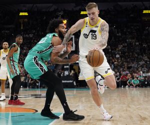 Mar 29, 2023; San Antonio, Texas, USA; Utah Jazz forward Luka Samanic (19) drives to the basket against San Antonio Spurs forward Julian Champaigne (30) during the first half at AT&T Center. Mandatory Credit: Scott Wachter-USA TODAY Sports