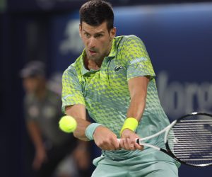 epa10501072 Novak Djokovic of Serbia in action against Daniil Medvedev of Russia during their semi final match at the Dubai Duty Free Tennis ATP Championships 2023 in Dubai, United Arab Emirates, 03 March 2023.  EPA/Frabeland Charles Mallari