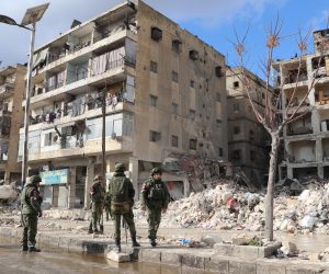 epa10453130 Russian military police stands among rubble of damaged houses at Masharqa neighborhood of Aleppo, Syria, 07 November 2023. Thousands of people died and thousands more were injured after major earthquakes struck southern Turkey and northern Syria on 06 February. Authorities fear the death toll will keep climbing as rescuers look for survivors across the region.  EPA/STRINGER