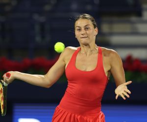 epa10478062 Marta Kostyuk of Ukraine in action against Ipek Oz of Turkey during their first round match at the Dubai Duty Free Tennis WTA Championships 2023 in Dubai, United Arab Emirates, 19 February 2023.  EPA/ALI HAIDER