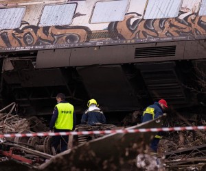 epa10496413 Rescuers at the scene of a train collision, near Larissa city, Greece, 01 March 2023. At least 32 people were killed and more than 85 were injured when a passenger train collided with a freight train, in Tempi, central Greece, near the city of Larissa, the Greek Fire Service said. Out of the 85 injured persons, 53 still remain in hospital, according to the spokesperson of the Fire Service, Vassilis Vathrokogiannis. Rescue workers continue the search for survivors focusing on the first two carriages of the passenger train.  EPA/ACHILLEAS CHIRAS