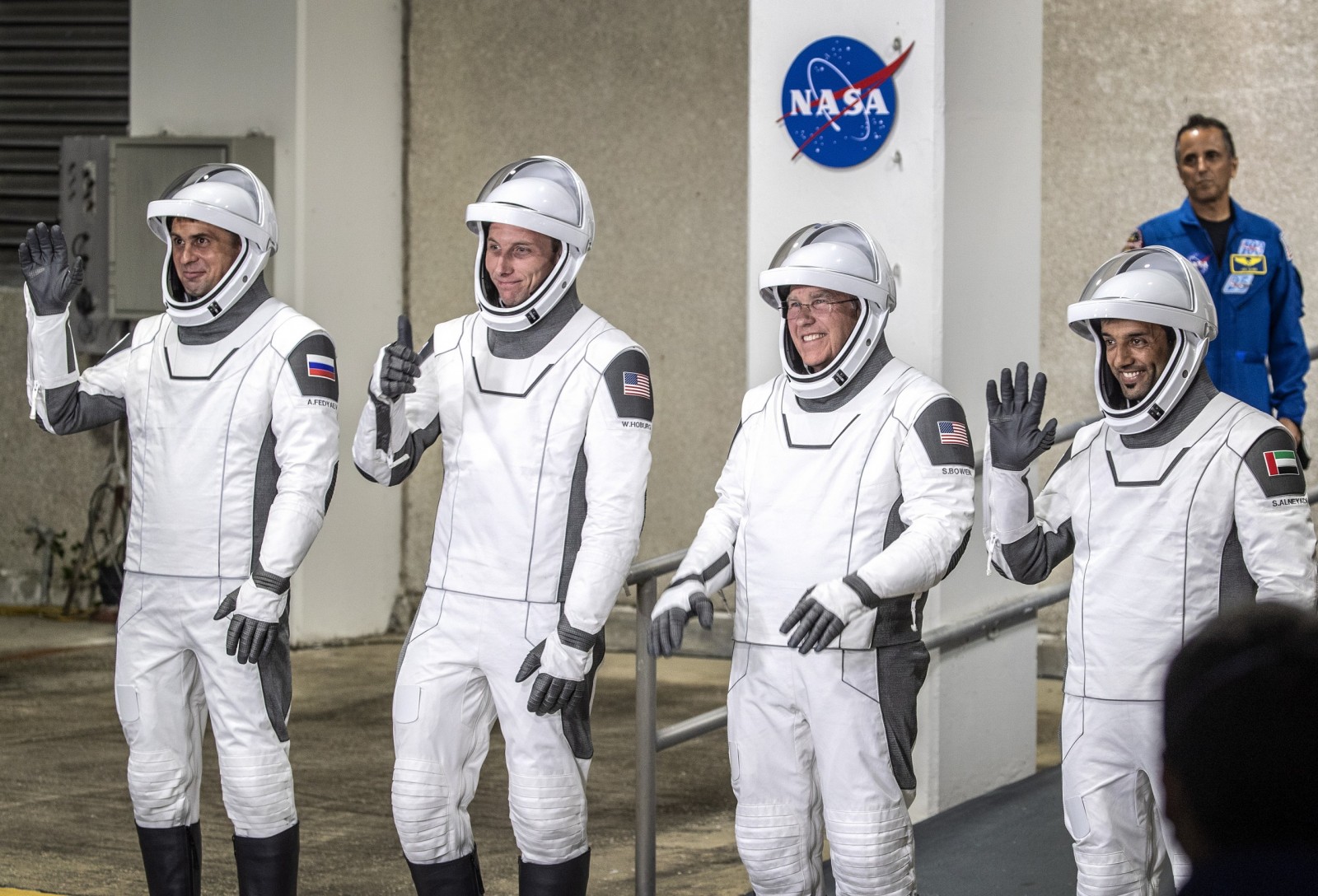 epa10498069 Members of the NASA's Crew-6 walk out of the Neil A. Armstrong Operations and Checkout Building for Launch Complex 39A in Titusville, Florida, USA, 01 March 2023. (L-R) Roscosmos cosmonaut Andrey Fedyaev, NASA’s Warren Hoburg and Stephen Bowen and UAE astronaut Sultan Alneyadi. According to the NASA, the Crew-6 launch will carry two NASA astronauts, Mission Commander Stephen Bowen and Pilot Warren Hoburg, along with UAE (United Arab Emirates) astronaut Sultan Alneyadi, and Roscosmos cosmonaut Andrey Fedyaev, who will serve as mission specialists to the space station for a science expedition mission. This is the sixth crew rotation mission with astronauts using the SpaceX Dragon spacecraft on a Falcon 9 rocket to the orbiting laboratory as part of the agency’s Commercial Crew Program.  EPA/CRISTOBAL HERRERA-ULASHKEVICH
