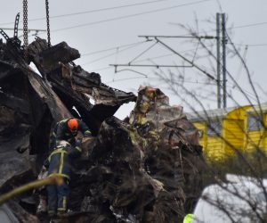 epa10498797 Firefighters operate in the aftermath of a train collision near Larissa city, Greece, 02 March 2023. The rescue workers searching for missing passengers are continuing to focus their efforts on the third carriage and are now attempting to cut it up so that its weight can be more evenly distributed so it can be moved. Teams are also looking through the charred remnants of the first two carriages with the assistance of cranes, which are utterly destroyed and also caught fire, working with great care due to the highly dangerous conditions. The confirmed death toll from the deadly Tempi train disaster had climbed to 46 on Thursday 02 March morning, a fire brigade spokesperson said, while 57 people injured in the crash remained in hospital, six of them in ICUs.  EPA/APOSTOLIS DOMALIS