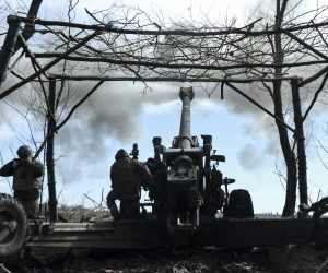 epa10500960 Ukrainian soldiers fire a FH70 howitzer from their position in the Zaporizhzhia area, Ukraine, 02 March 2023 (issued 03 March 2023) Russian troops entered Ukrainian territory on 24 February 2022, starting a conflict that has provoked destruction and a humanitarian crisis.  EPA/STR