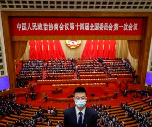 epa10502066 A security member stands guard after the opening session of the Chinese People's Political Consultative Conference (CPPCC) at the Great Hall of the People, in Beijing, China, 04 March 2023. China holds two major annual political meetings, the National People's Congress (NPC) and the Chinese People's Political Consultative Conference (CPPCC) which run alongside and together are known as 'Lianghui' or 'Two Sessions'.  EPA/MARK R. CRISTINO
