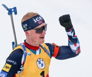 epa10502510 Johannes Thingnes Boe of Norway celebrates winning the men's 12.5km Pursuit race at the IBU Biathlon World Cup in Nove Mesto na Morave, Czech Republic, 04 March 2023.  EPA/MARTIN DIVISEK