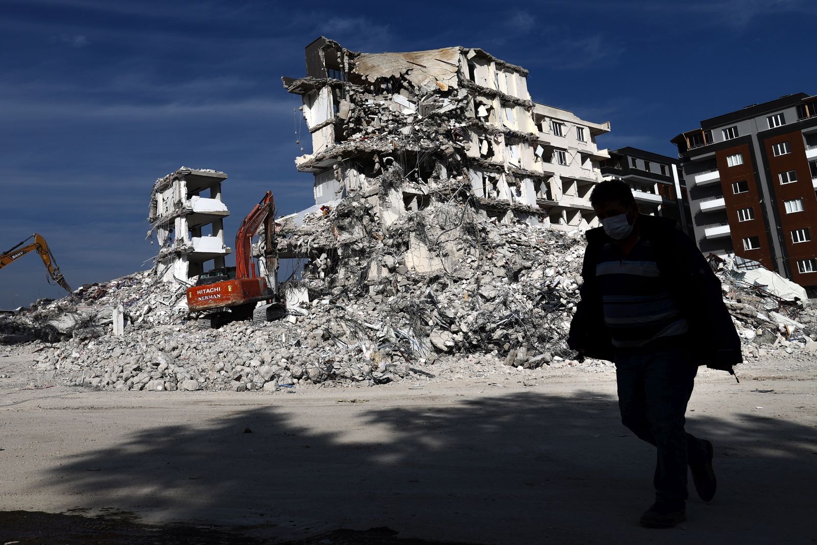 epa10502722 A demolition team works in the aftermath of the powerful earthquakes in Nurdagi district of Gaziantep, Turkey, 04 March 2023. More than 50,000 people died and thousands more were injured after major earthquakes struck southern Turkey and northern Syria on 06 February and again on 20 February 2023.  EPA/SEDAT SUNA
