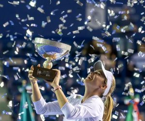 epaselect epa10505772 Donna Vekic of Croatia celebrates with the trophy after defeating Caroline Garcia of France in the final of the Monterrey Open tennis tournament, in Monterrey, Mexico, 05 March 2023.  EPA/MIGUEL SIERRA
