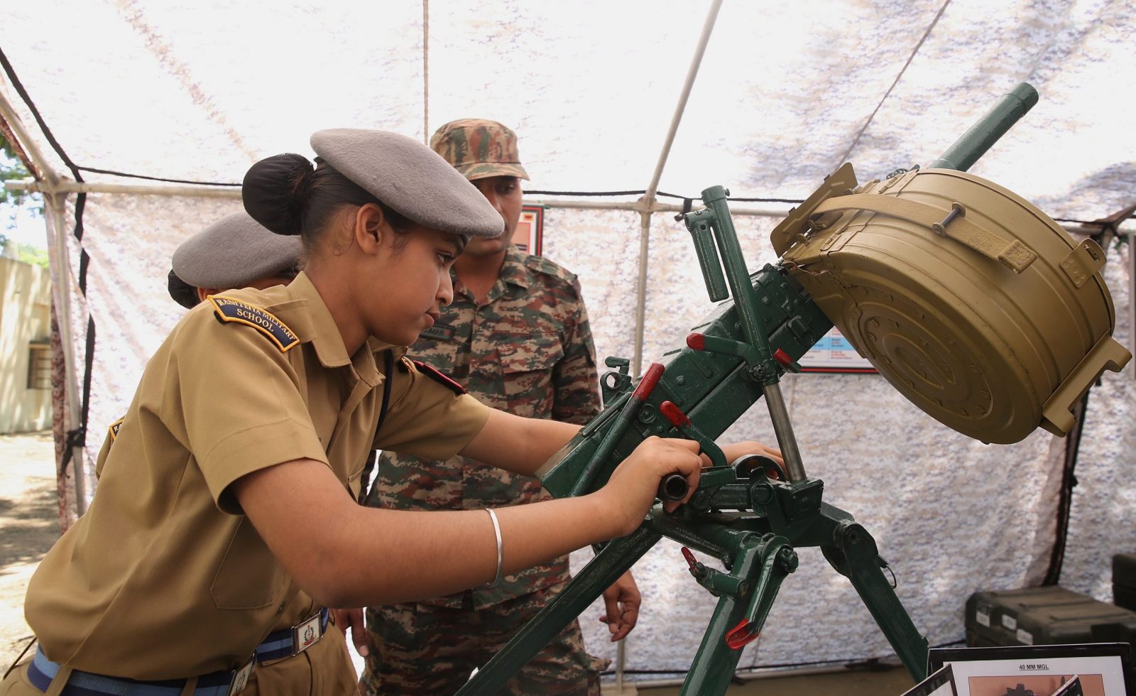 epa10505865 The first batch of female cadets of the Rashtriya Military School (RMS) visit the static weapons display, in Bangalore, India, 06 March 2023. The Rashtriya Military School (RMS), an institution established by the Indian Army and run under the aegis of Ministry of Defence, is one of the premier residential public schools.  EPA/JAGADEESH NV