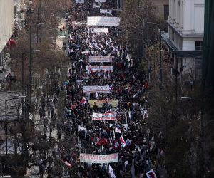 epa10509052 People rally during a nationwide 24-hour strike following a deadly train crash that claimed the lives of at least 57 people, in Athens, Greece 08 March 2023. The Greek Civil Servants' Confederation (ADEDY) announced a 24-hour nationwide strike in the public sector on 08 March, a week after the deadly head-on crash between two trains along the Athens-Thessaloniki line on the night of 28 February. According to ADEDY, the strike was called 'to demand an end to the policy of privatization’, as well as to hold accountable those responsible for the fatal crash.  EPA/GEORGE VITSARAS