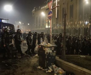 epa10510296 Georgian police prepare to block the street during a rally to protest the so-called 'Foreign Agents Law' which the Georgian Parliament is going to adopt in the future, in front of the Parliament building in Tbilisi, Georgia, 08 March 2023. The law says that a Georgian legal entity, which is more than 20 percent funded from abroad, must be considered as an agent of foreign influence and has to register with the Georgian Ministry of Justice. Special Forces and police began to disperse several hundred oppositionists who were trying to break the gates of the Georgian parliament building. Earlier, the leader of the opposition Strategy Agmashenebeli party, Giorgi Vashadze, issued an ultimatum to the authorities to withdraw the law on foreign agents from parliament and release all protesters detained the day before.  EPA/ZURAB KURTSIKIDZE