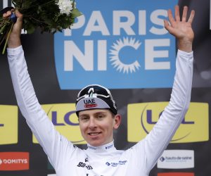 epa10506361 Slovenian rider Tadej Pogacar UAE Team Emirates celebrates on the podium retaining the best young rider's white jersey following the 2nd stage of the Paris Nice cycling race over 163.7 km from Bazainville to Fontainebleau, France, 06 March 2023.  EPA/YOAN VALAT