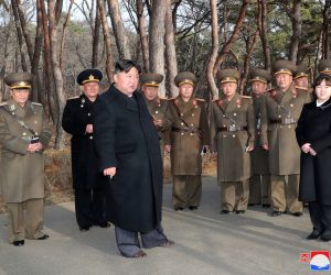 epa10512828 A photo released by the official North Korean Central News Agency (KCNA) shows Supreme Leader Kim Jong Un (3-L) and his daughter Kim Ju-ae (R) at an artillery drill in an undisclosed location in North Korea, 09 March 2023 (issued 10 March 2023). According to KCNA, Supreme Leader Kim Jong Un 'gave field guidance' at the 'fire assault drill' by the Hwasong artillery unit of the Korean People's Army.  EPA/KCNA   EDITORIAL USE ONLY