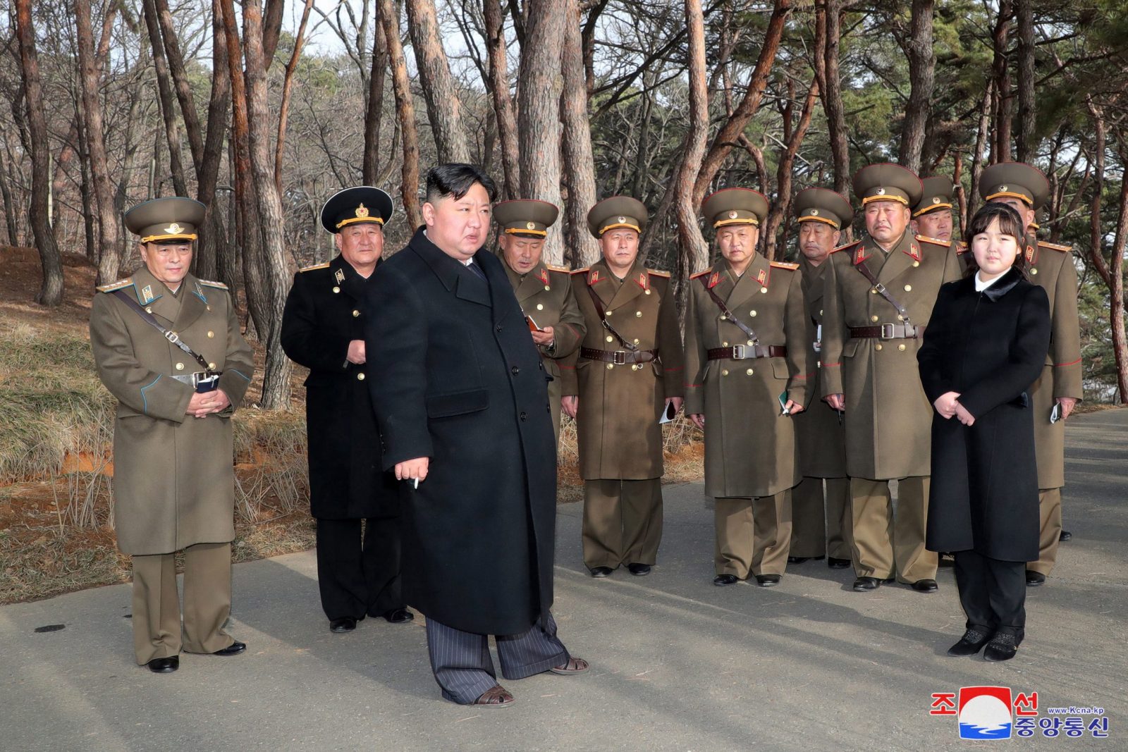 epa10512828 A photo released by the official North Korean Central News Agency (KCNA) shows Supreme Leader Kim Jong Un (3-L) and his daughter Kim Ju-ae (R) at an artillery drill in an undisclosed location in North Korea, 09 March 2023 (issued 10 March 2023). According to KCNA, Supreme Leader Kim Jong Un 'gave field guidance' at the 'fire assault drill' by the Hwasong artillery unit of the Korean People's Army.  EPA/KCNA   EDITORIAL USE ONLY