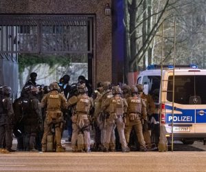 epa10512740 Armed police officers gather at the scene of a shooting in Hamburg, Germany, 09 March 2023. According to police, the shooting took place around 9 pm, killing seven people and injuring at least eight others. The gunman is believed to be among the several dead found in the building, police said.  EPA/NEWS5