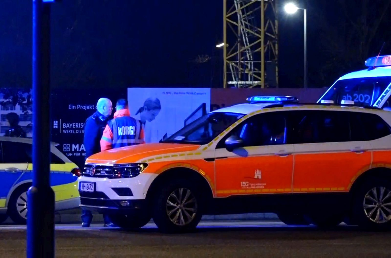 epa10512751 Emergency workers and police gather at the scene of a shooting in Hamburg, Germany, 09 March 2023. According to police, the shooting took place around 9 pm, killing seven people and injuring at least eight others. The gunman is believed to be among the several dead found in the building, police said.  EPA/NEWS5     BEST QUALITY AVAILABLE
