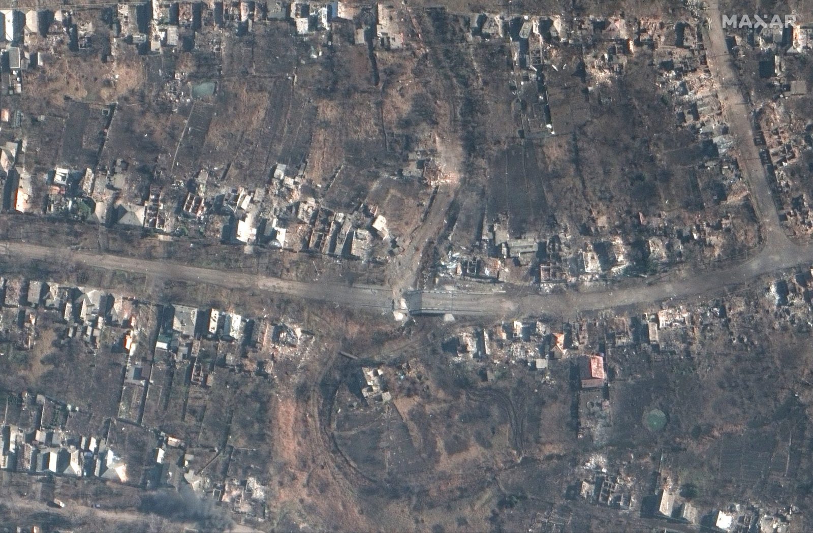 epa10513685 A handout satellite image made available by Maxar Technologies on 10 March 2023 shows a destroyed bridge and roadway, amid the ongoing battle for Bakhmut, Ukraine, 06 March 2023 (issued 10 March 2023). Russian troops entered Ukrainian territory on 24 February 2022, starting a conflict that has provoked destruction and a humanitarian crisis.  EPA/MAXAR TECHNOLOGIES HANDOUT -- MANDATORY CREDIT: SATELLITE IMAGE 2022 MAXAR TECHNOLOGIES -- THE WATERMARK MAY NOT BE REMOVED/CROPPED -- HANDOUT EDITORIAL USE ONLY/NO SALES