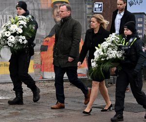 epa10513870 Hamburg Interior Senator Andy Grote (2-L) and German Interior minister Nancy Faeser (C) visit the scene of a shooting in Hamburg, Germany, 10 March 2023. According to Hamburg authorities, at least eight people died, including the suspected gunman, and eight others were injured in a shooting that occurred at a Jehovah's Witness meeting hall in the evening of 09 March. The police are investigating the motive of the incident.  EPA/FILIP SINGER