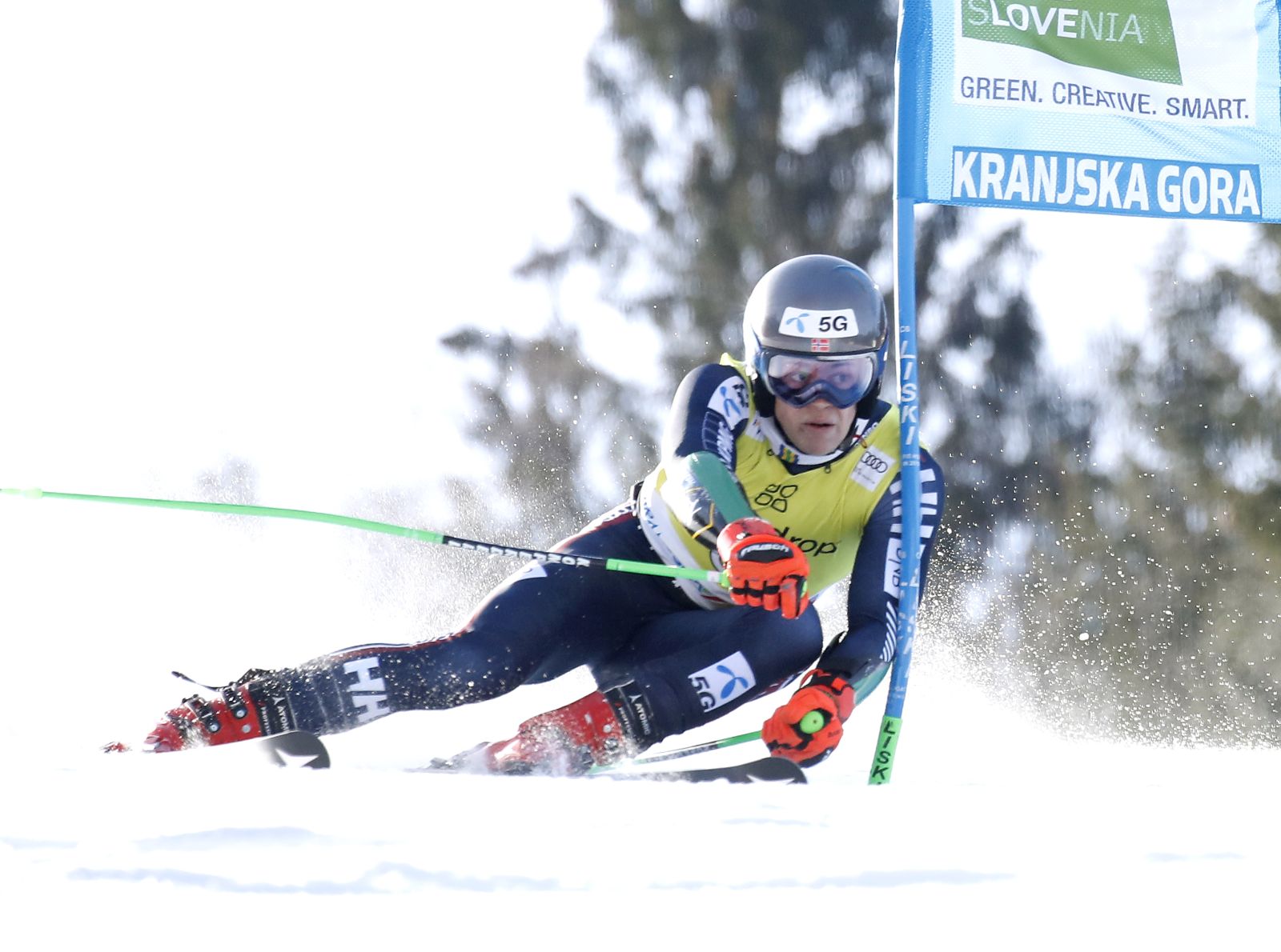 epa10516493 Lucas Braathen of Norway clears a gate during the first run of the Men's Giant Slalom of the FIS Alpine Skiing World Cup in Kranjska Gora, Slovenia, 12 March 2023.  EPA/ANTONIO BAT