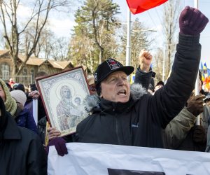 epa10517356 Supporters of the Shor political party protest in the main street of Chisinau, Moldova, 12 March 2023. The protesters called on the government to not involve Moldova in the Russian-Ukrainian war, increase pensions and for support for their winter energy bills.  EPA/DUMITRU DORU