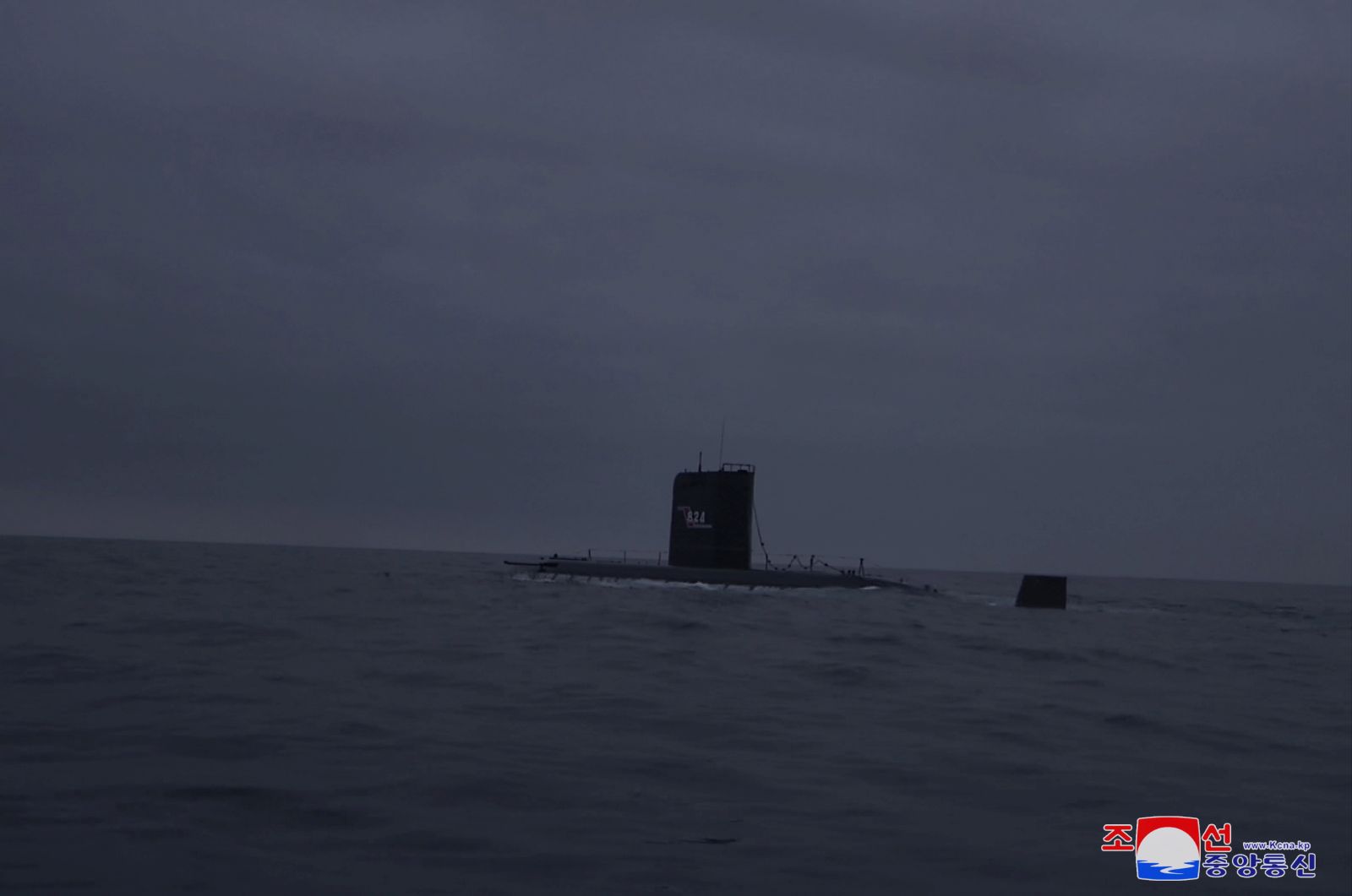 epa10519109 A photo released by the official North Korean Central News Agency (KCNA) shows a North Korean submarine during a cruise missile launch, off the east coast of North Korea, 12 March 2023 (issued 13 March 2023).  According to North Korean state media, two cruise missiles were launched from a 8.24 Yongung submarine, and travelled aroud 1,500 km before striking a sea-borne target. The missile launch occured a day before the scheduled start of US-South Korean joint military drills.  EPA/KCNA   EDITORIAL USE ONLY