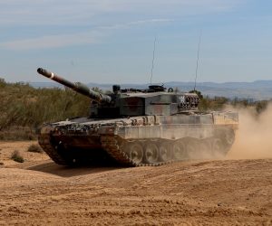 epa10520432 One of the Spanish Leopard 2A4 tanks that will be sent to Ukraine is maneuvered during a training with Ukrainian soldiers at the San Gregorio military base in Zaragoza, Spain, 13 March 2023. According to Spain's Defence Minister Margarita Robles, Spain will send a first shipment of six Leopard 2A4 tanks and plans to send more to Ukraine while they are also training 55 Ukrainian soldiers, including 40 in the handling of the tanks as crew and others in the tanks' maintenance.  EPA/Javier Cebollada