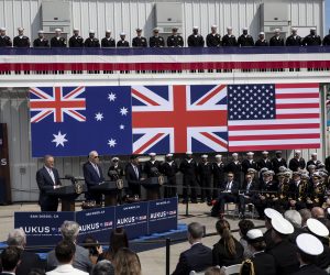 epa10521428 (L-R) Australian Prime Minister Anthony Albanese, US President Joe Biden and United Kingdom Prime Minister Rishi Sunak hold a press conference at the Naval Base Point Miramar in San Diego, California, USA, 13 March 2023. The three leaders announced that Australia will purchase nuclear-powered attack submarines from the U.S.  EPA/ETIENNE LAURENT